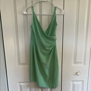 This is a Hello Molly Wrap Midi Dress in a bright green/mint color